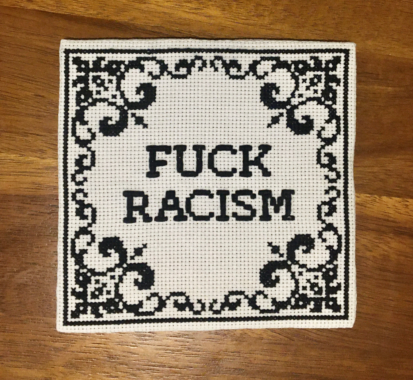 "Fuck Racism" cross stitch pattern with ornate, gothic border -