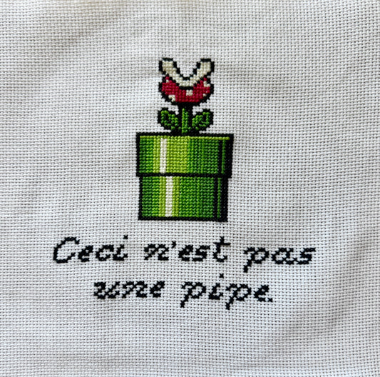 "Ceci n'est pas une pipe" piranha plant cross stitch pattern - 